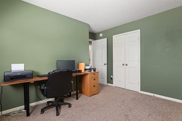 4407 Iron Creek Ct, Fresno, TX 77545 - home office featuring light carpet, baseboards, and a textured ceiling