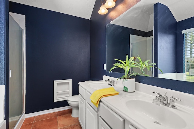 4407 Iron Creek Ct, Fresno, TX 77545 - bathroom with double vanity, toilet, baseboards, tile patterned flooring, and a stall shower