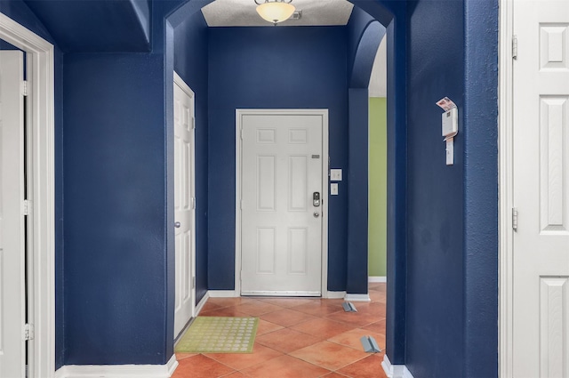 4407 Iron Creek Ct, Fresno, TX 77545 - tiled foyer with arched walkways and baseboards