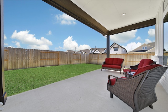 view of patio / terrace with an outdoor hangout area and a fenced backyard