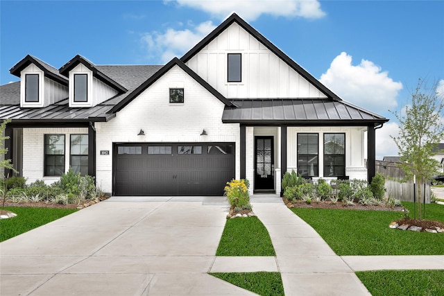 modern farmhouse style home featuring a standing seam roof, brick siding, and board and batten siding