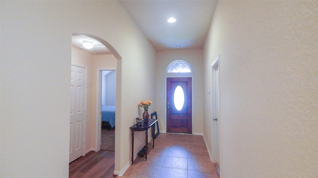 15407 Vincennes Oak St, Cypress, TX 77429 - entrance foyer featuring arched walkways, baseboards, and light tile patterned floors
