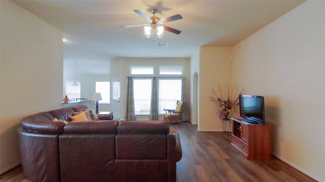 15407 Vincennes Oak St, Cypress, TX 77429 - living area featuring ceiling fan, baseboards, dark wood-type flooring, and visible vents