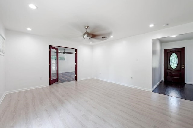 interior space with visible vents, wood finished floors, ceiling fan, and recessed lighting