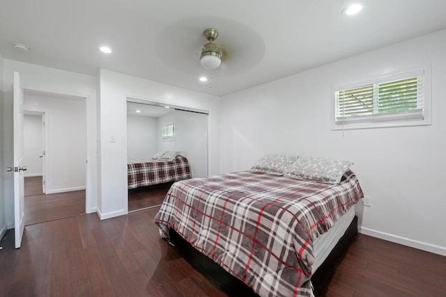 bedroom featuring a closet, recessed lighting, ceiling fan, wood-type flooring, and baseboards