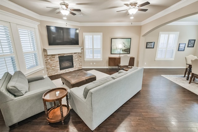 11002 Upland Forest Dr, Houston, TX 77043 - living room with crown molding, dark wood finished floors, baseboards, and a ceiling fan