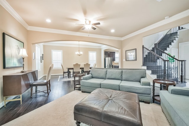 11002 Upland Forest Dr, Houston, TX 77043 - living area with stairs, arched walkways, baseboards, and ceiling fan with notable chandelier