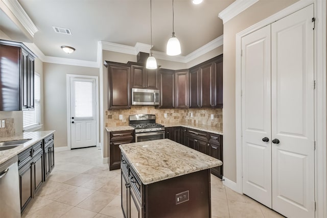 11002 Upland Forest Dr, Houston, TX 77043 - kitchen with ornamental molding, visible vents, dark brown cabinetry, backsplash, and appliances with stainless steel finishes