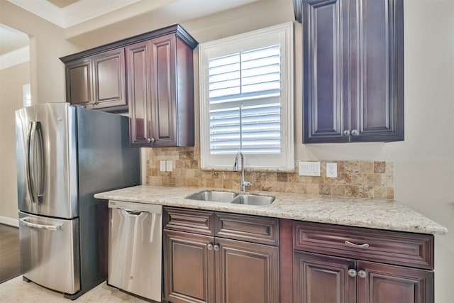 11002 Upland Forest Dr, Houston, TX 77043 - kitchen with a sink, crown molding, stainless steel appliances, and backsplash