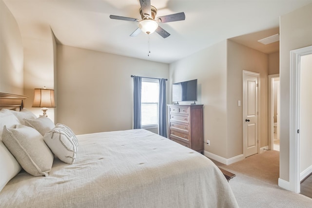 11002 Upland Forest Dr, Houston, TX 77043 - bedroom featuring baseboards, light colored carpet, and a ceiling fan