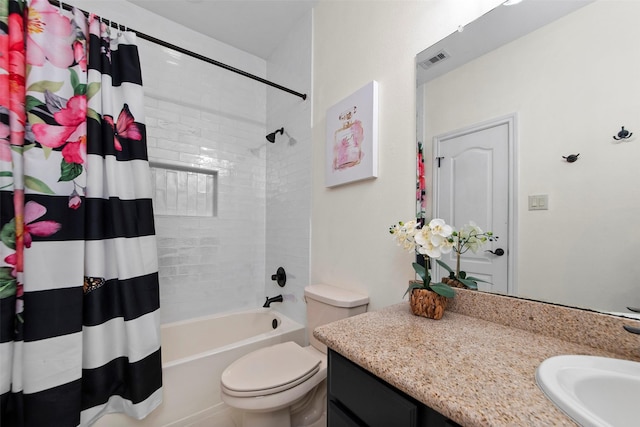 full bath featuring toilet, vanity, visible vents, and shower / bath combination with curtain