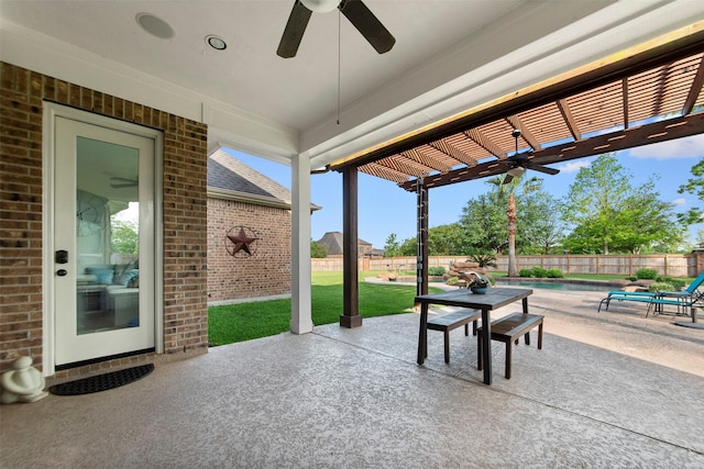 view of patio with a fenced in pool, a pergola, a ceiling fan, and a fenced backyard