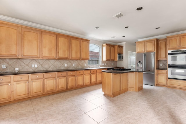 kitchen featuring tasteful backsplash, ornamental molding, visible vents, dark countertops, and appliances with stainless steel finishes