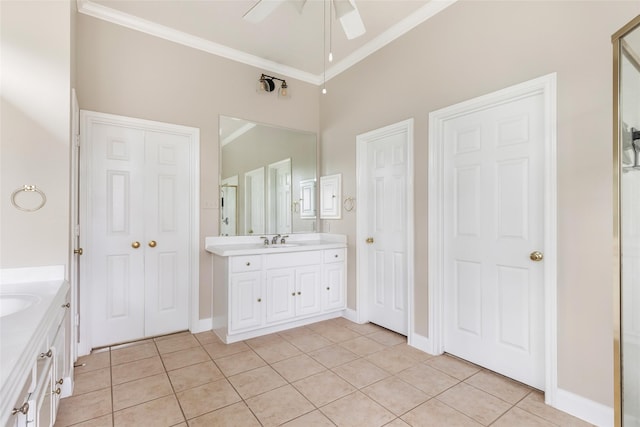 full bathroom featuring a ceiling fan, baseboards, ornamental molding, tile patterned flooring, and vanity