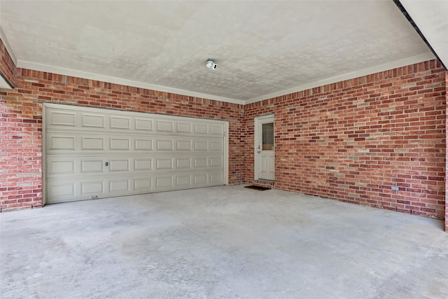 garage with concrete driveway