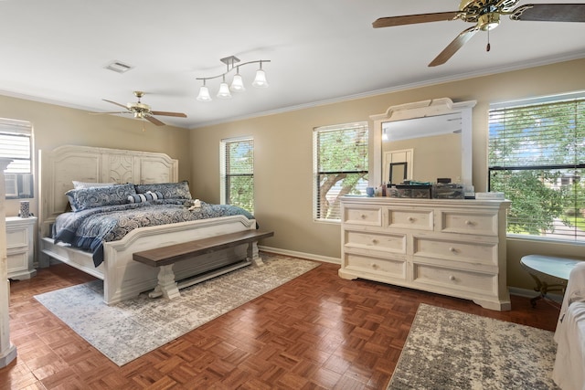 6180 Afton Ln, Beaumont, TX 77706 - bedroom with multiple windows, visible vents, a ceiling fan, and crown molding