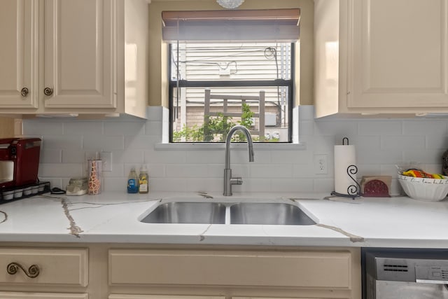 6180 Afton Ln, Beaumont, TX 77706 - kitchen featuring tasteful backsplash, a sink, and dishwasher