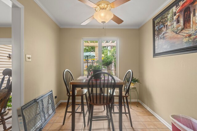6180 Afton Ln, Beaumont, TX 77706 - dining space featuring ornamental molding, light tile patterned floors, baseboards, and ceiling fan
