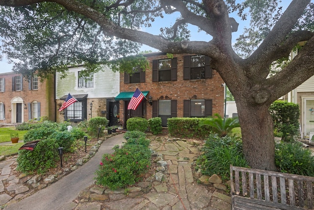 6180 Afton Ln, Beaumont, TX 77706 - view of front facade featuring brick siding