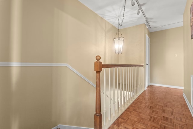 6180 Afton Ln, Beaumont, TX 77706 - hallway with an upstairs landing and baseboards
