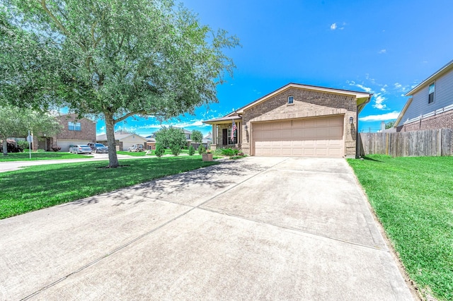 ranch-style home with concrete driveway, brick siding, a front lawn, and fence