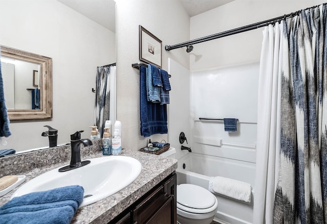 full bathroom with shower / bath combination with curtain, toilet, and vanity