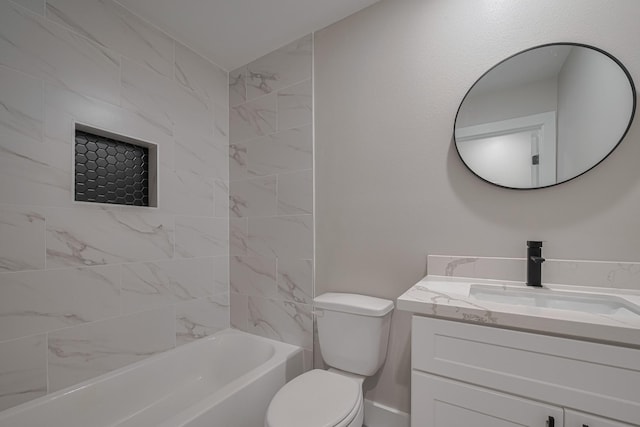 full bath with toilet, baseboards, vanity, and shower / bathtub combination