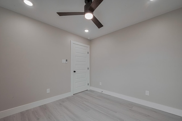 spare room with recessed lighting, baseboards, a ceiling fan, and light wood-style floors