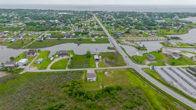 aerial view with a water view and a residential view
