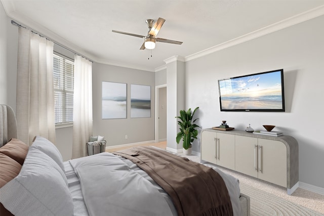 bedroom with light colored carpet, ornamental molding, baseboards, and ceiling fan