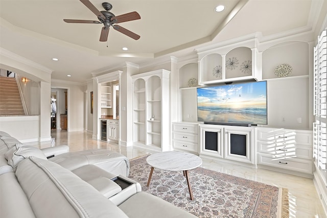 living room with built in features, recessed lighting, crown molding, a ceiling fan, and beverage cooler