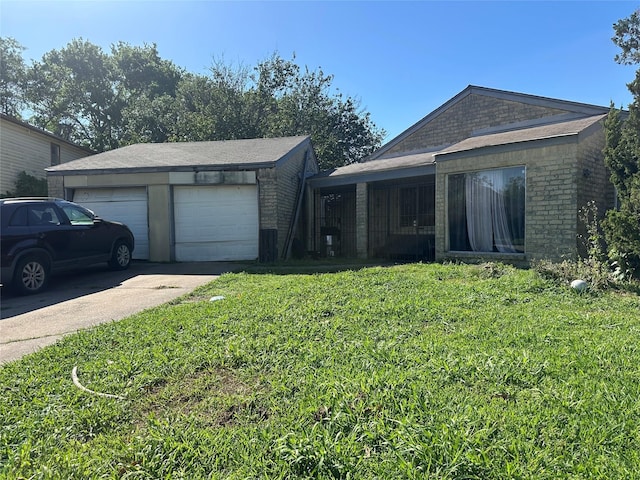 view of front of property featuring brick siding and a front yard