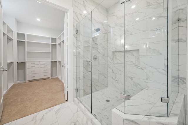 519 W 27th St, Houston, TX 77008 - bathroom with a stall shower, marble finish floor, recessed lighting, and a walk in closet