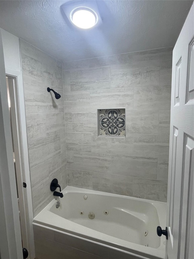 1107 Dover Cir, Alvin, TX 77511 - bathroom with a combined bath / shower with jetted tub and a textured ceiling