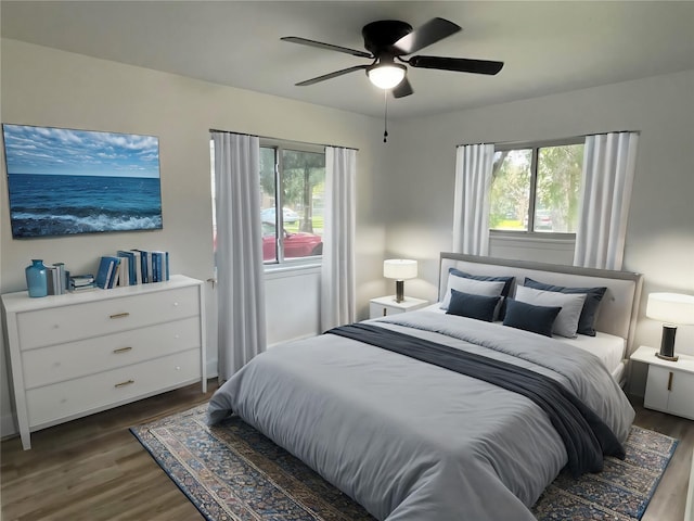 1107 Dover Cir, Alvin, TX 77511 - bedroom featuring multiple windows, dark wood finished floors, and ceiling fan