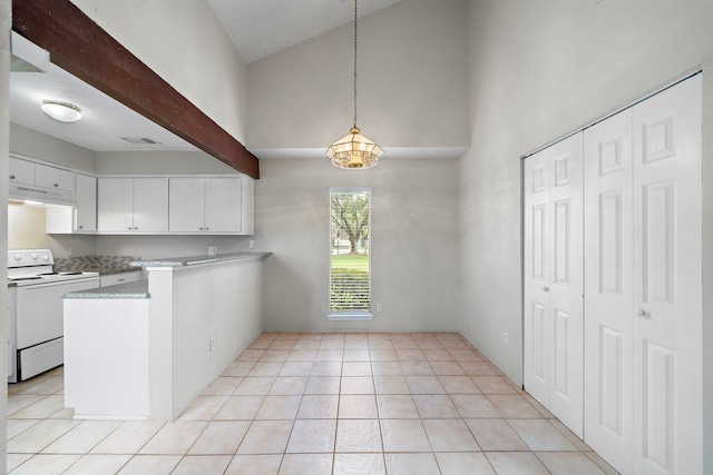 kitchen featuring under cabinet range hood, white electric range, white cabinetry, a peninsula, and light countertops