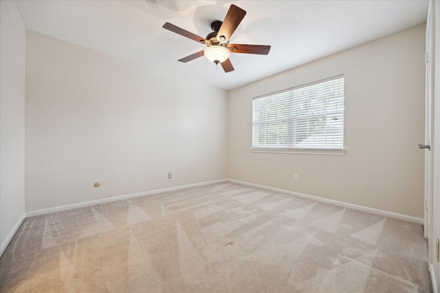 1415 Stependale Dr, Katy, TX 77450 - spare room with baseboards, light carpet, and ceiling fan
