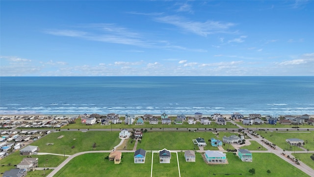 aerial perspective of suburban area featuring a nearby body of water