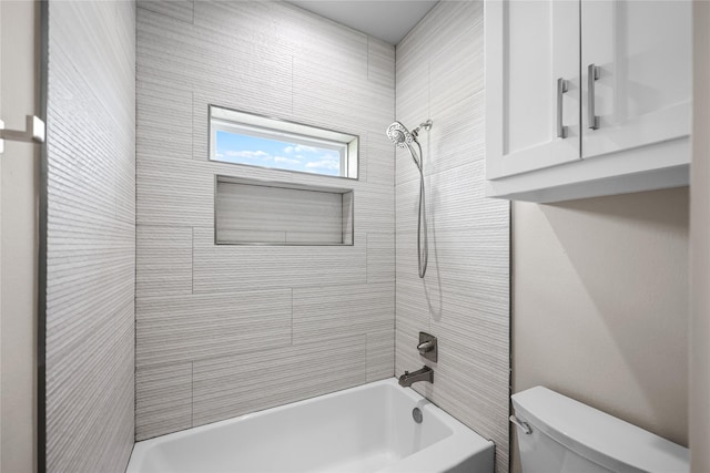 bathroom with toilet and shower / tub combination