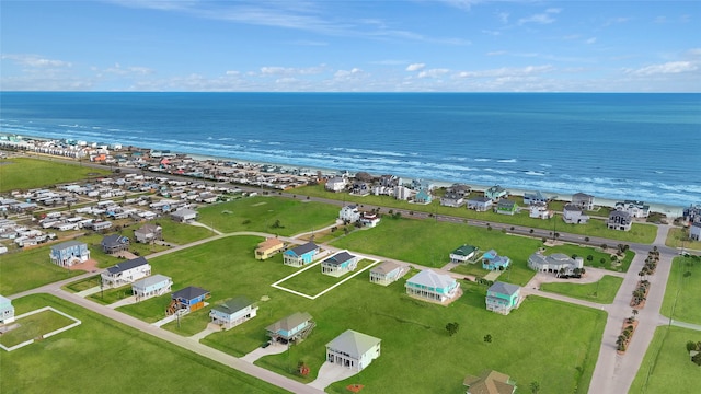 aerial perspective of suburban area with a large body of water