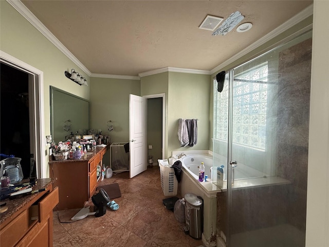 bathroom with crown molding, visible vents, a jetted tub, and vanity