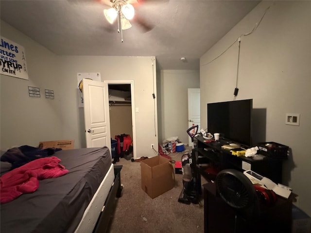bedroom with a closet, ceiling fan, and carpet