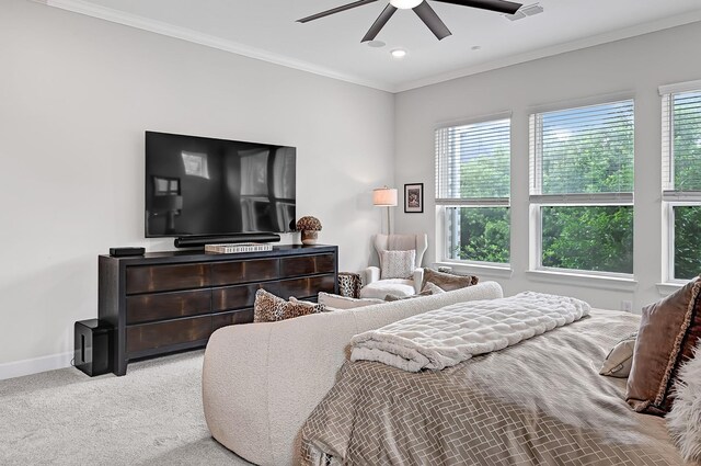 carpeted bedroom with multiple windows, baseboards, ornamental molding, and recessed lighting