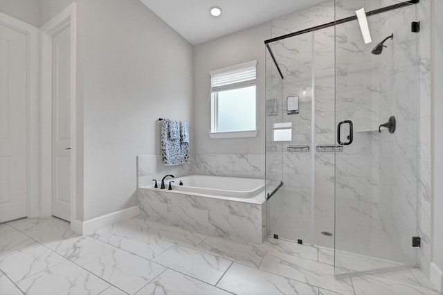 bathroom with a marble finish shower, marble finish floor, baseboards, and a garden tub