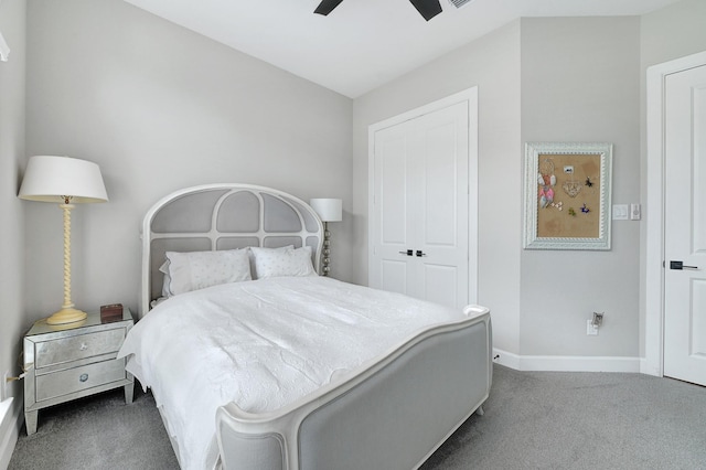 bedroom with ceiling fan, carpet floors, baseboards, and a closet