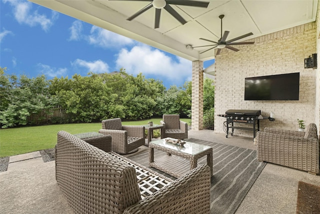 view of patio featuring ceiling fan, fence, and grilling area