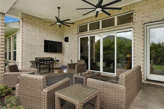 view of patio featuring ceiling fan and area for grilling