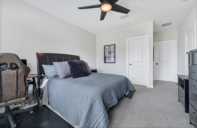 bedroom featuring carpet flooring, visible vents, baseboards, and ceiling fan