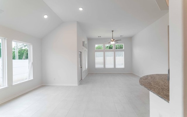23403 Malbec Dr, Alvin, TX 77511 - empty room featuring a ceiling fan, baseboards, recessed lighting, vaulted ceiling, and light tile patterned floors