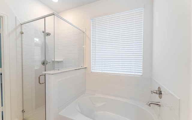 23403 Malbec Dr, Alvin, TX 77511 - bathroom with a garden tub and a stall shower